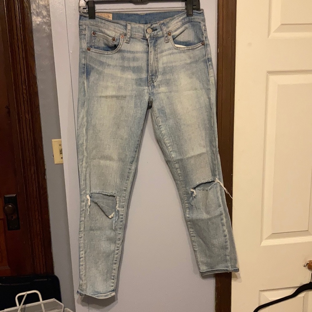 Distressed light wash jeans